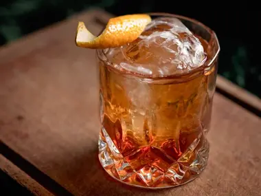 Gin adds warmth and floral essence to the Old Fashioned.