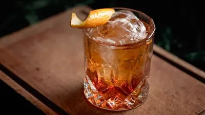 Gin adds warmth and floral essence to the Old Fashioned.