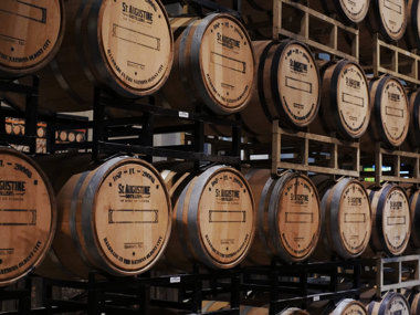 The barrel acts as a catalyst, imparting flavors, colors, and aromas to the bourbon.